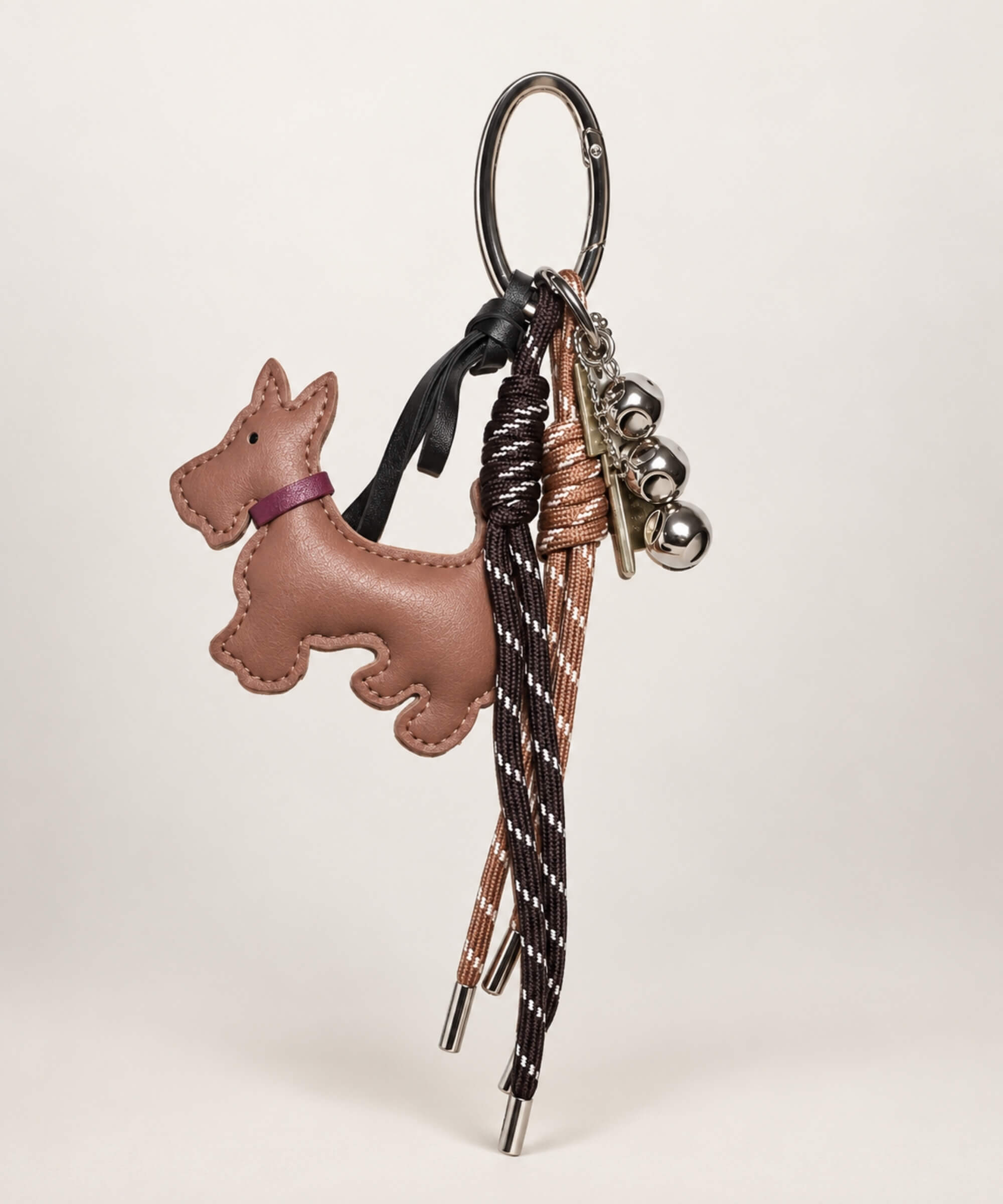 Brown Scottish Terrier PU leather bag charm keychain with brown rope cords and metallic accents